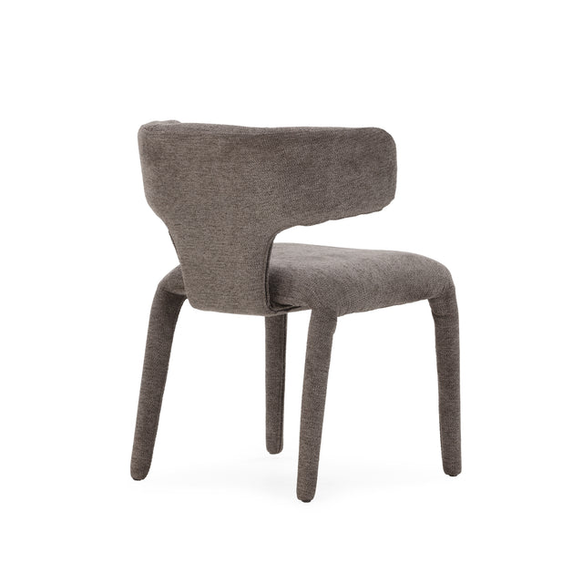 Silla de comedor Maca Gris oscuro y patas tapizadas, detalle del diseño desde otro ángulo
