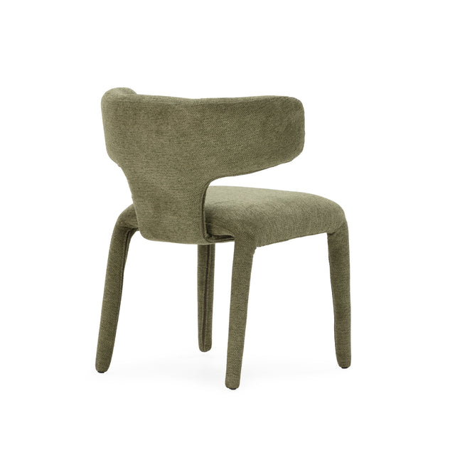 Silla de comedor Maca Verde y patas tapizadas, detalle del diseño desde otro ángulo