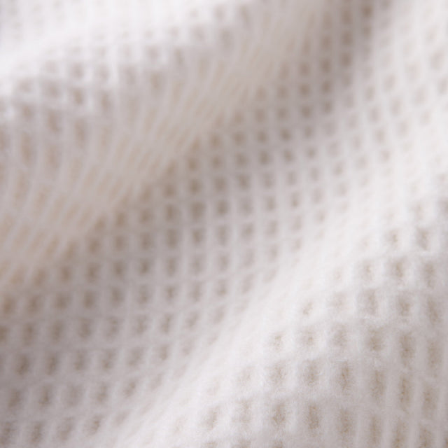 Mueble Manta Basics Waffle Crema con acabado crema en ambiente de estilo nórdico