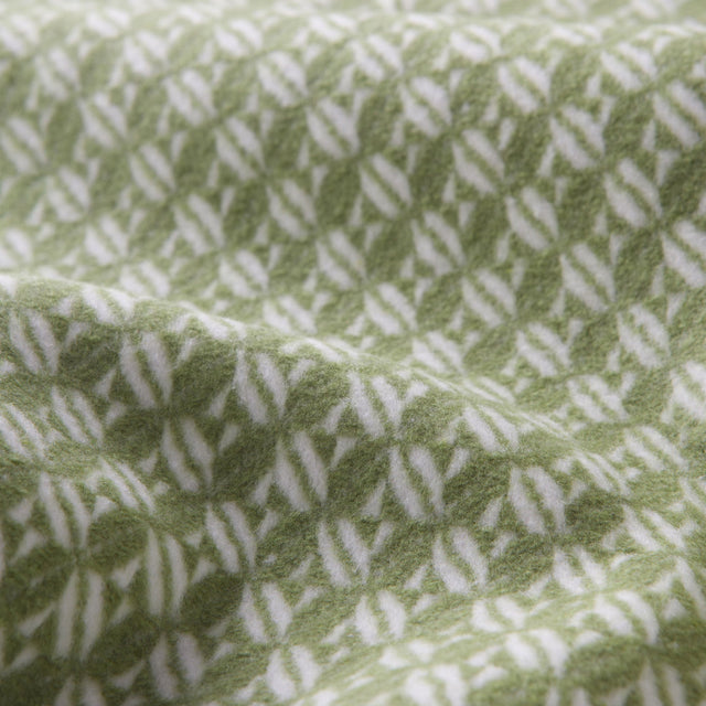 Mueble Manta Nilo Verde Oliva con verde oliva, acabado verde en ambiente de estilo nórdico