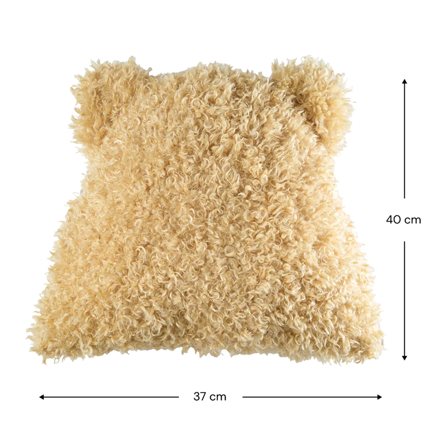 Mueble Cojín Osito de Peluche Amarillo en ambiente de estilo nórdico